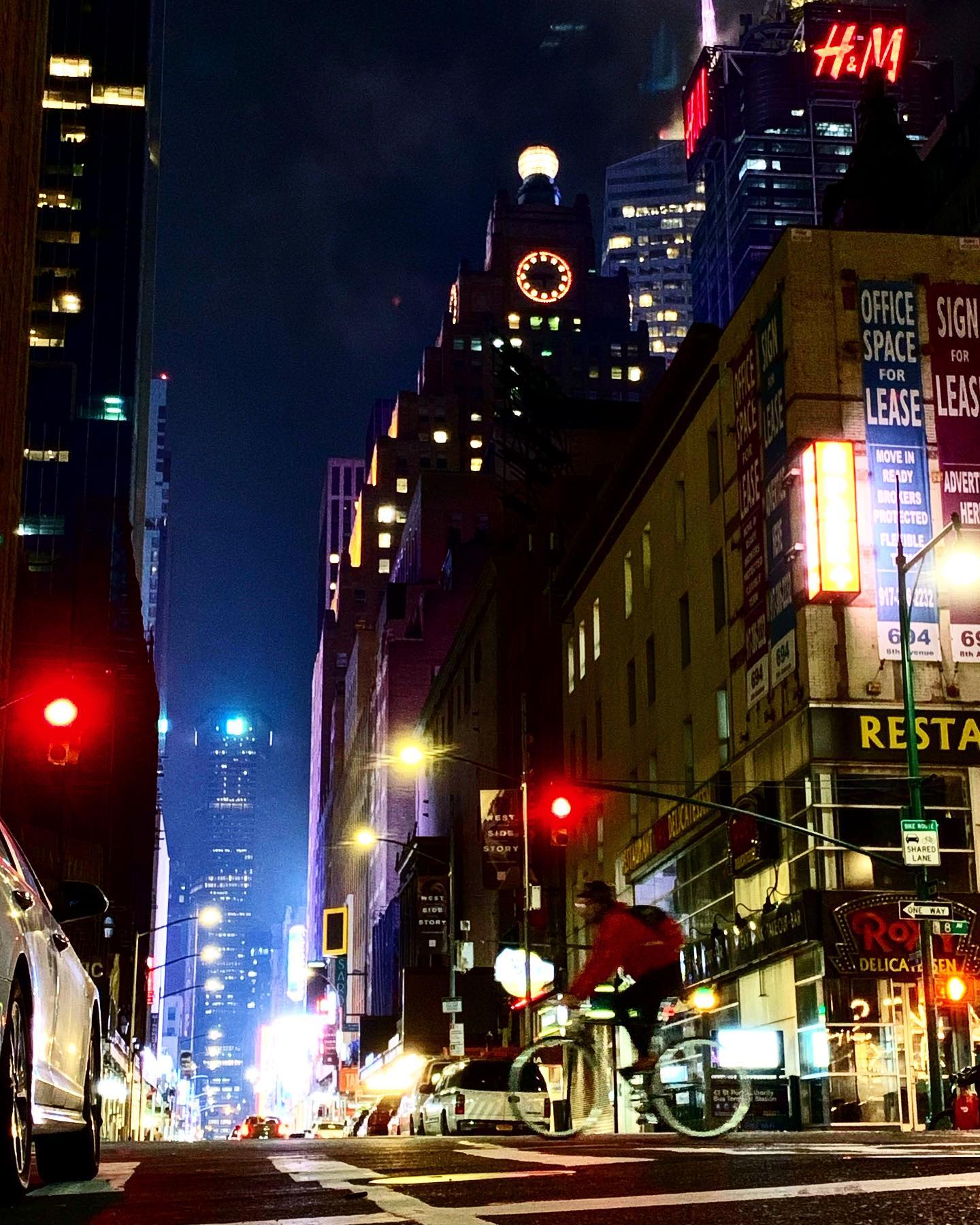 Manhattan street glowing at night